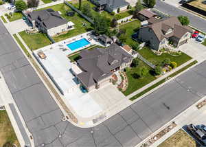 Aerial perspective of suburban area with a pool area