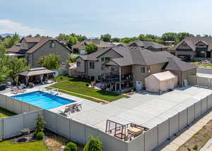 View of swimming pool featuring a gazebo, a residential view, and a patio