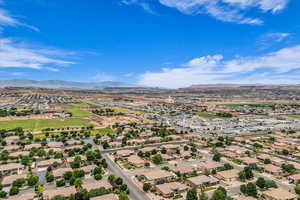 Aerial perspective of suburban area with mountains