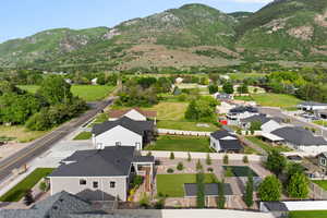 Aerial view of neighborhood with mountain backdrop