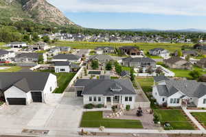 Aerial view of neighborhood with mountain backdrop