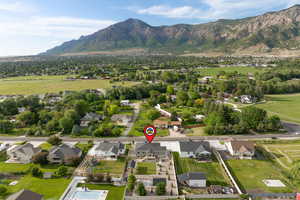 Aerial view of neighborhood with mountain backdrop