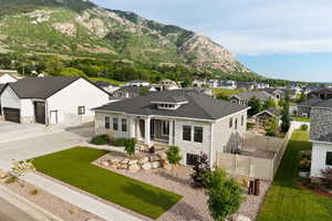 Front of property with a mountain view