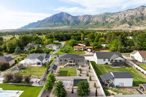 Aerial view of neighborhood with mountain backdrop