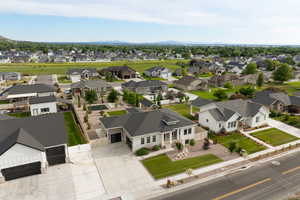 Aerial view of neighborhood featuring front of property