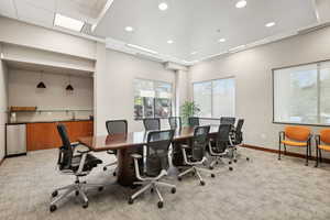 Office with light carpet, recessed lighting, and baseboards