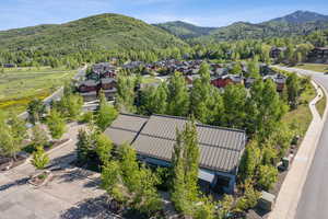 Aerial view of residential area featuring mountains