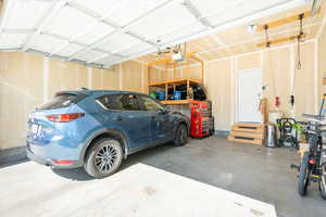 Garage featuring a garage door opener