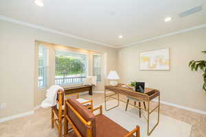 Front room can be used as a home office or formal living space.