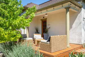 Doorway to property with stucco siding