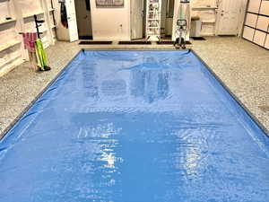 View of pool featuring a covered pool