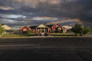 View of front of home with covered porch