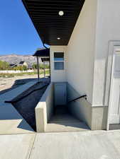 Stairway featuring a mountain view