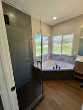 Master bath - European glass shower and extra large soaker tub