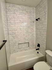 Tile all the way up to the ceiling surrounding the tub.