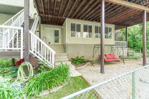 View of patio with stairs