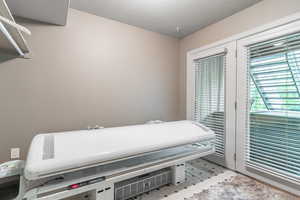 Miscellaneous room featuring a textured ceiling