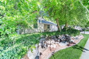 View of side of property with brick siding
