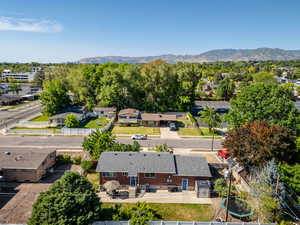 Aerial perspective of suburban area with a mountain backdrop