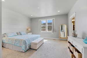 Bedroom with carpet, recessed lighting, and baseboards