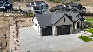 Aerial view of residential area featuring mountains