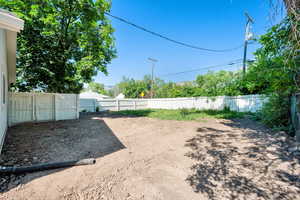 View of fenced backyard
