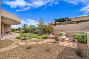 View of yard with a patio area and a pergola