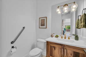 Bathroom with vanity and toilet