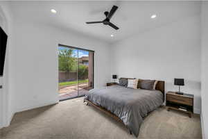 Carpeted bedroom featuring access to exterior, recessed lighting, baseboards, and a ceiling fan