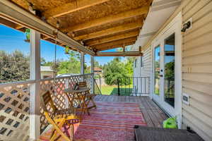 Deck with rollong shades off of the Kitchen/Dining