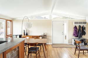 Entryway featuring light wood-style flooring and baseboards
