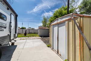 Fenced backyard featuring a patio area