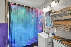 Bathroom with vanity.