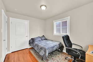 Another view of bedroom with office area.
