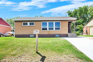 Another view of the front of house wth a better view of shingled roof.