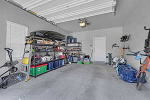 Garage featuring a garage door opener