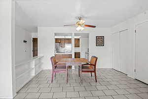 Dining space with ceiling fan