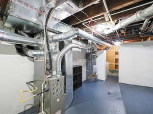 Unfinished below grade area with strapped water heater