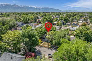 Aerial view of residential area featuring a mountain backdrop