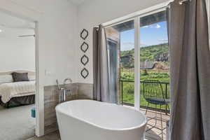Ensuite bathroom with a freestanding bath