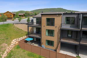 View of property with a mountain view