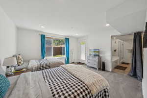 Basement level bedroom with ensuite bathroom