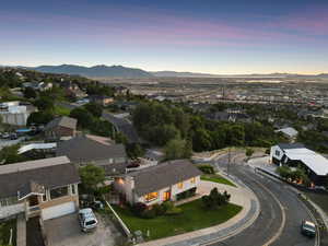 Aerial view at dusk of a mountain view and a residential view