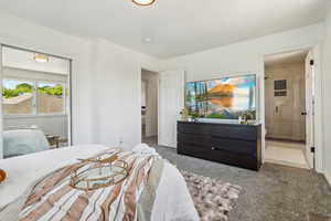 Primary bedroom featuring connected bathroom