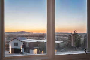 Valley view featuring a mountainous background in office/bedroom