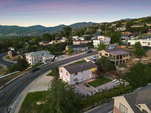 Aerial view at dusk of a mountain view and a residential view