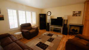 Living area with wood finished floors