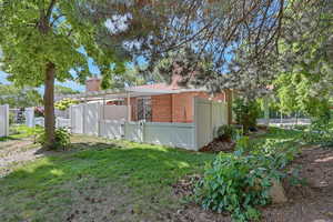 View of yard with a gate