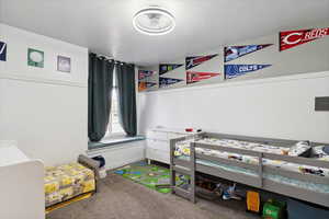 Bedroom featuring carpet
