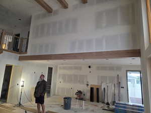 View of beam framing kitchen.